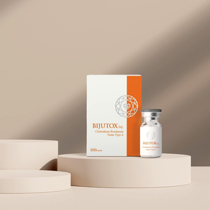 a white and orange box with a bottle of medicine